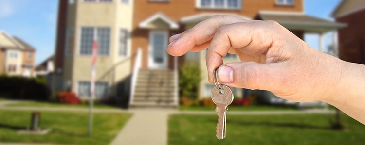 Hand holding a key